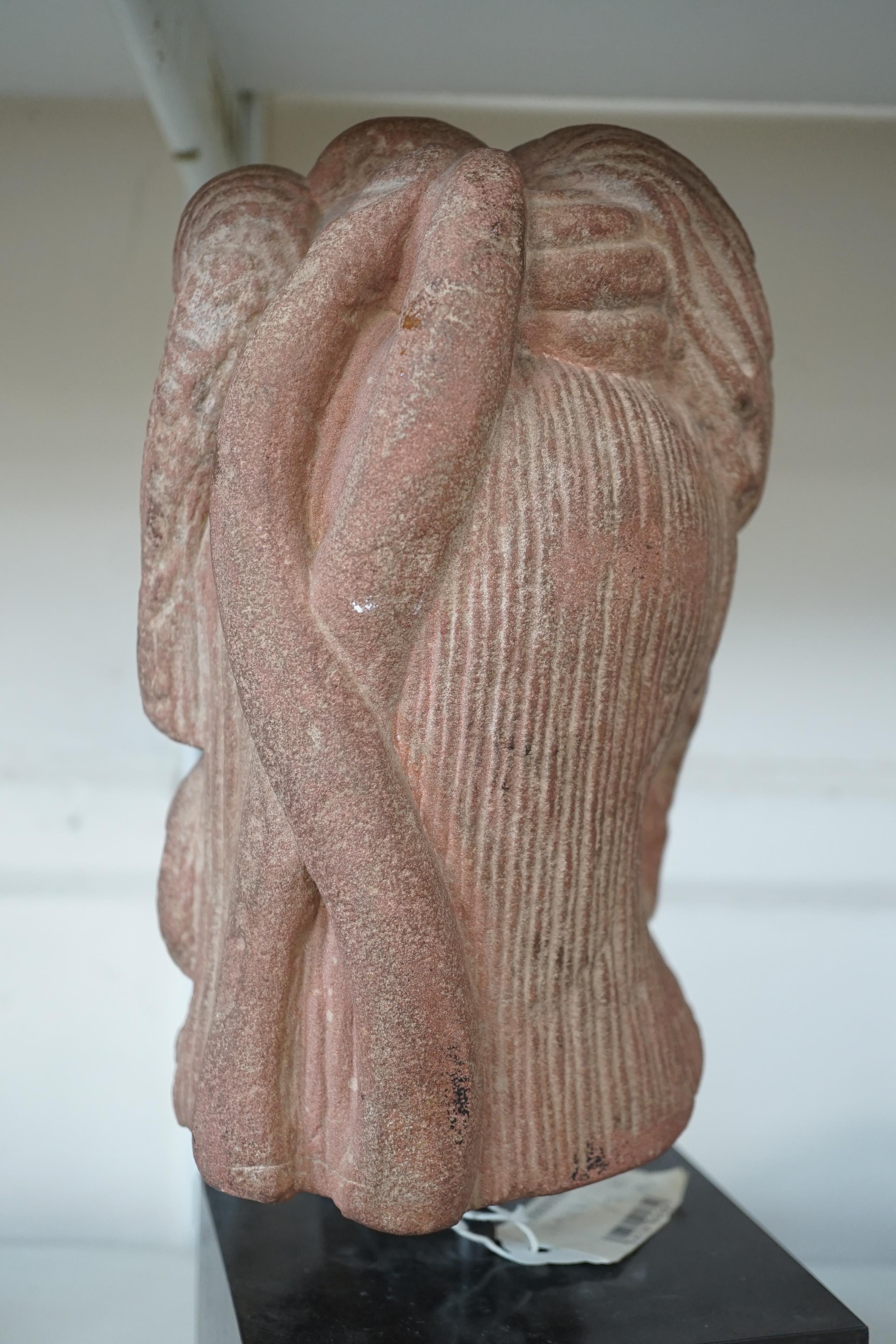 A red stone head of Ardhanarishvara, Muthura region, India, Gupta period, c.5th century A.D.